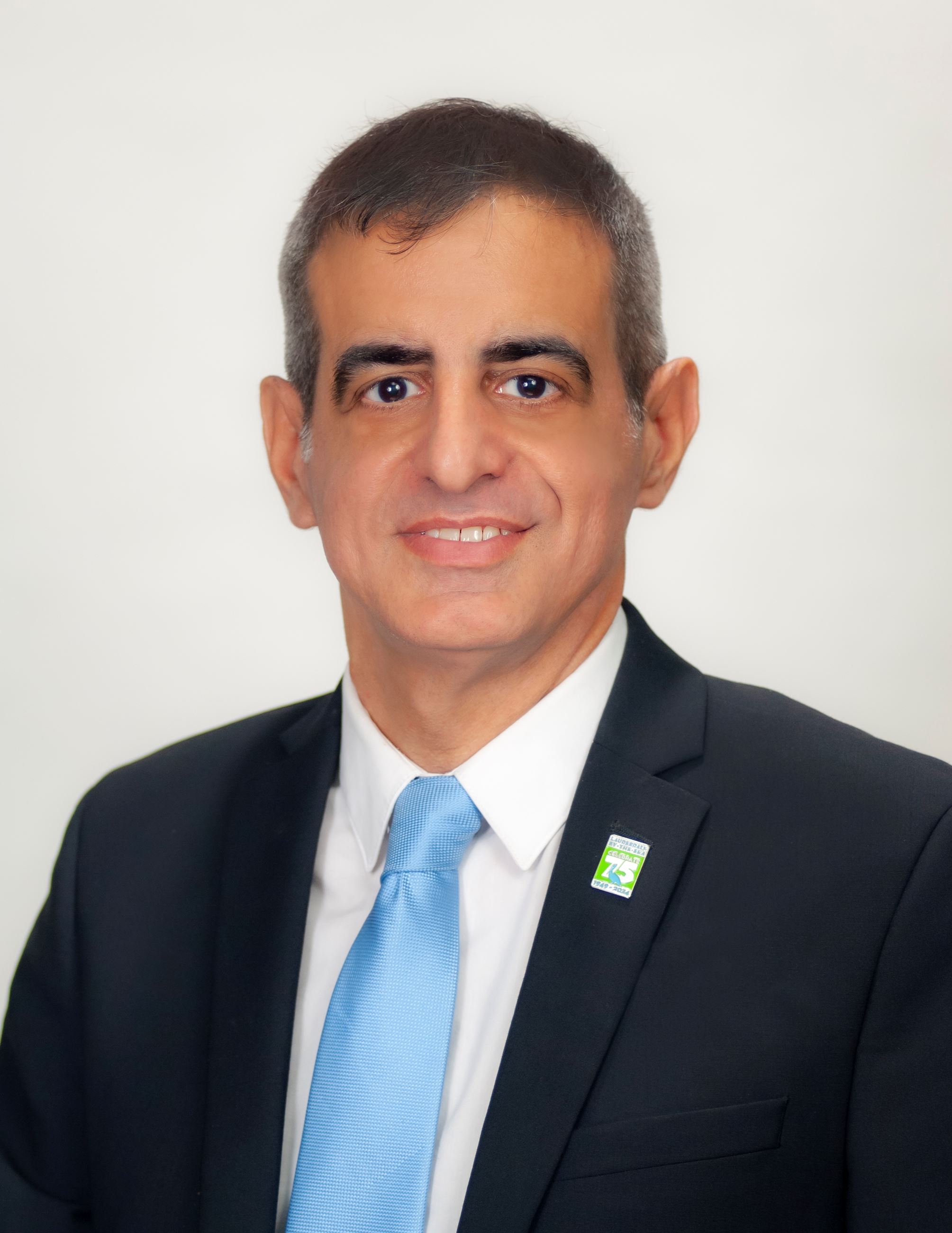 Commissioner Edmund Malkoon